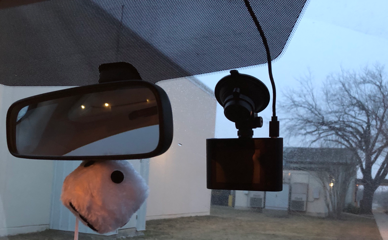 Mounted. It is mostly hidden behind the mirror, but that’s OK because I don’t really need to interact with it while driving.
